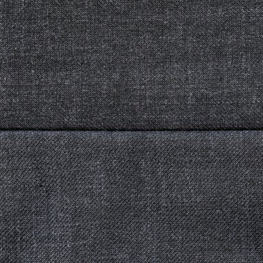 koyu gri kumaş doku dikiş ile dekore edilmiştir.