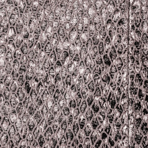 Коричневая искусственная кожа змеи в качестве фона — стоковое фото