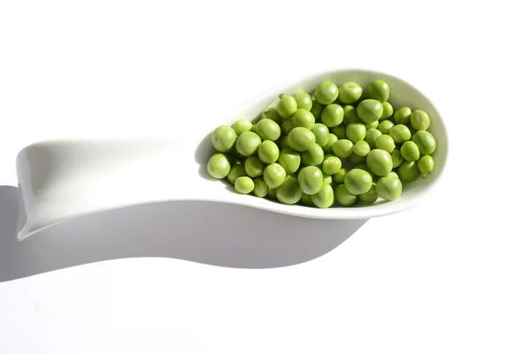 Fresh peas  in white bowl — Stock Photo, Image