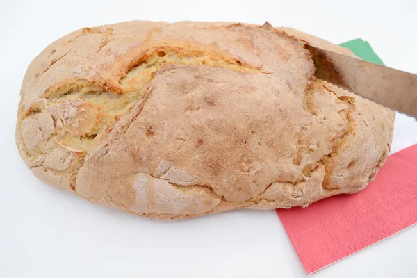 Bread with cutter — Stock Photo, Image