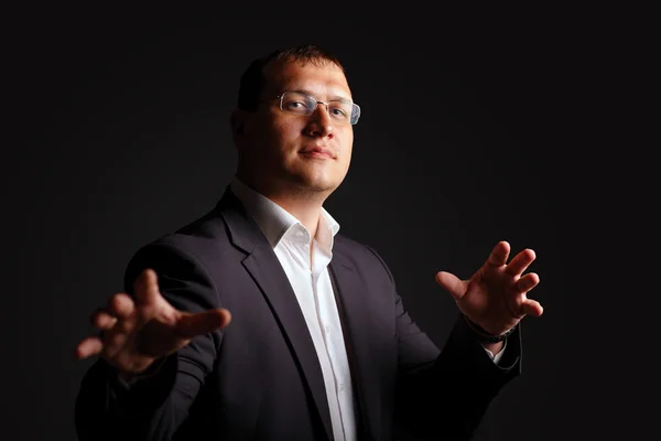 Young male businessman posing in studio. — Stock Photo, Image