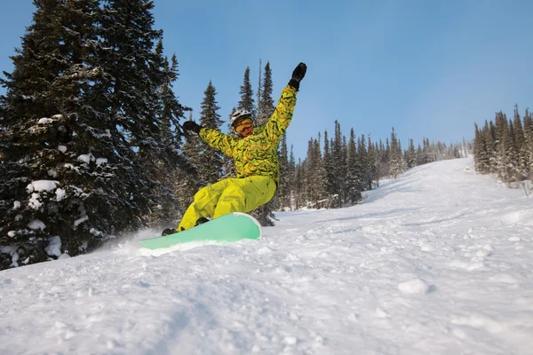 Snowboarder doing a toe side carve — Stock Photo, Image