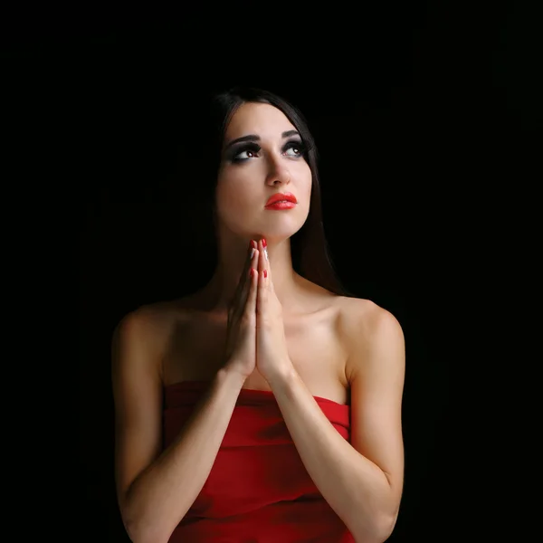 Portrait of a young caucasian woman praying — Stock Photo, Image