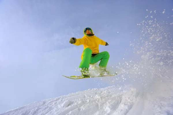 Salto de snowboarder — Fotografia de Stock