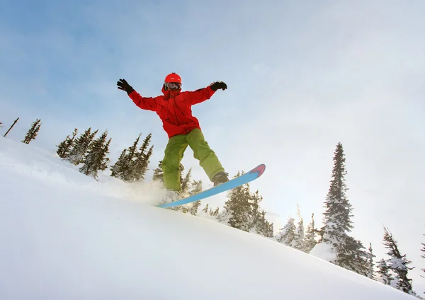 Snowboarder doen een teen kant snijden — Stockfoto