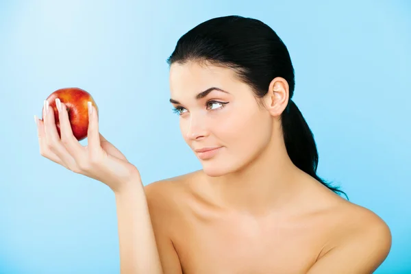 Pretty woman with red apple — Stock Photo, Image