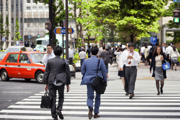 Tokyo,financial district,people during lunch break in business district Nishi-Shinjuku