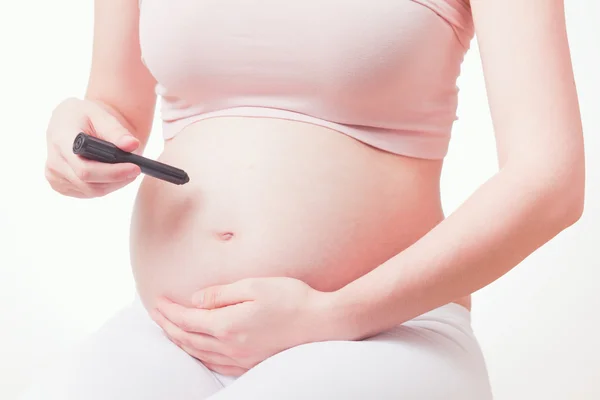 Nahaufnahme von einem süßen Schwangerschaftsbauch — Stockfoto