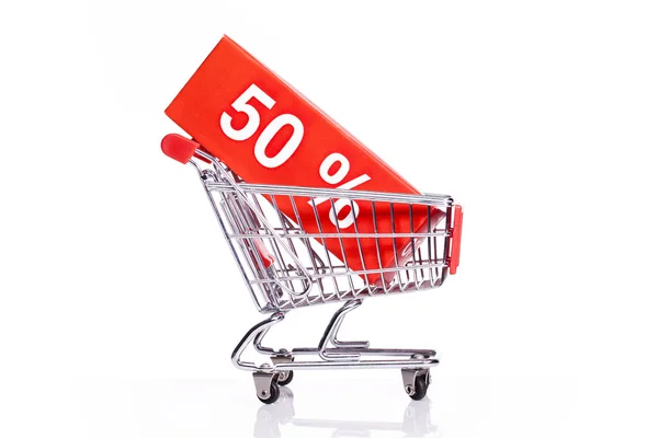 Shopping cart with sales icon — Stock Photo, Image