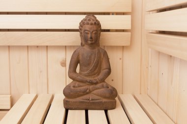 Ayurveda sembolleri gevşeme ve iç güzellik, Buda heykeli Sauna için