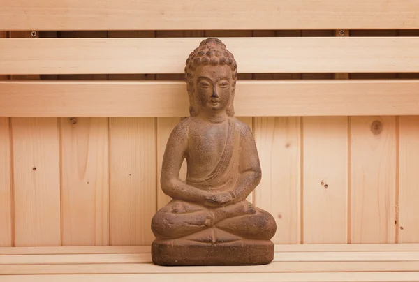 Símbolos ayurveda para relaxamento e beleza interior, estátua buddha na sauna — Fotografia de Stock