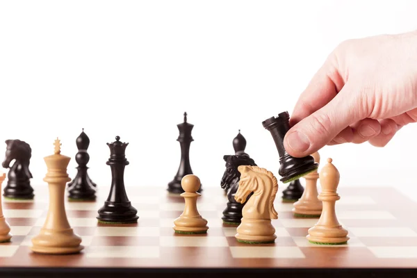 Moving chess pieces on a chessboard — Stock Photo, Image