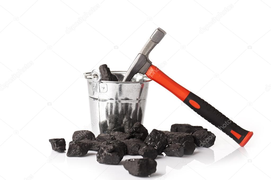 mining tools and ucket full of coal