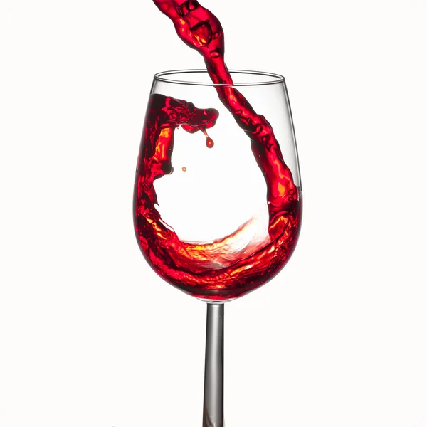 Versando vino rosso, spruzzi di vino — Foto Stock