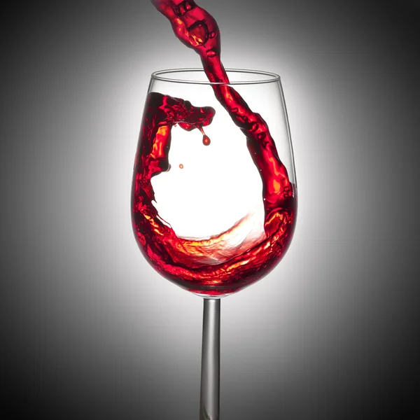 Czerwone wino rozpryskiwania, degustacja win koncepcja — Zdjęcie stockowe