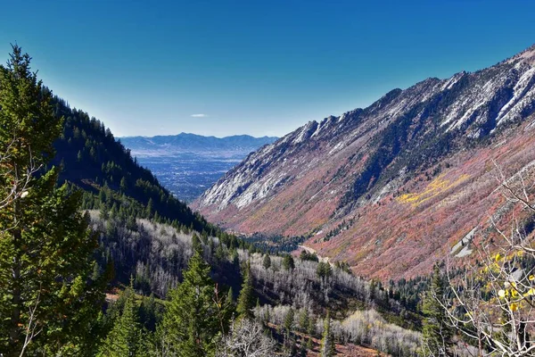 Red Pine Lake views from trail mountain landscape towards Salt Lake Valley in Little Cottonwood Canyon, Wasatch Rocky mountain Range, Utah, United States.