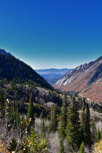 Red Pine Lake views from trail mountain landscape towards Salt Lake Valley in Little Cottonwood Canyon, Wasatch Rocky mountain Range, Utah, United States.