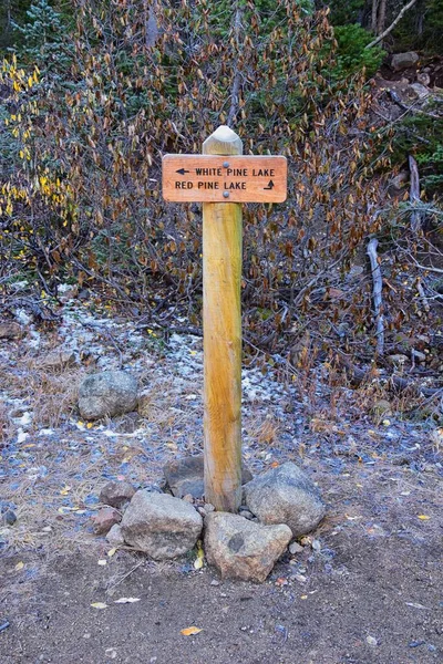 Trail Sign on Red Pine and White Pine Lake hiking trail in Lone Peak Wilderness on White Baldy and Pfeifferhorn in Little Cottonwood Canyon, Wasatch Rocky mountain Range, Utah, United States.