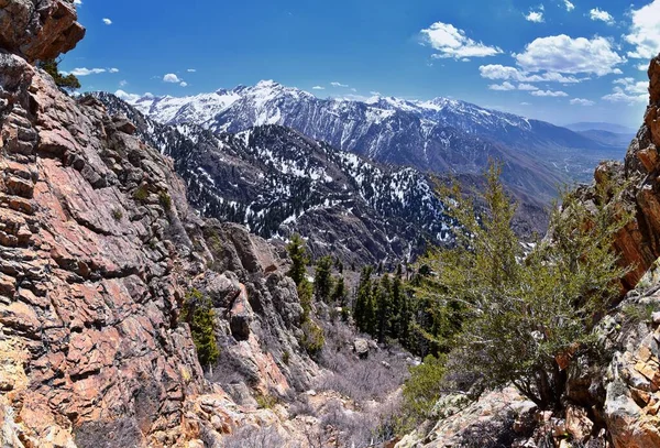 Wasatch Front Mount Olympus Peak hiking trail inspiring views in spring via Bonneville Shoreline, Rocky Mountains, Salt Lake City, Utah. United States. USA