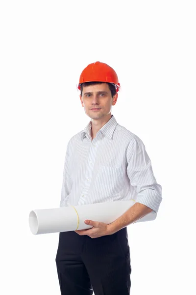 Homem de camisa, capacete de construção laranja com um rolo de papel — Fotografia de Stock
