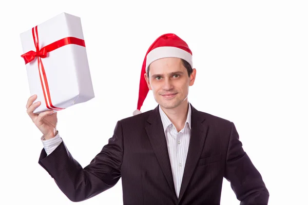 Man in suit and hat with Christmas gift hand on white backgro — Stock Photo, Image