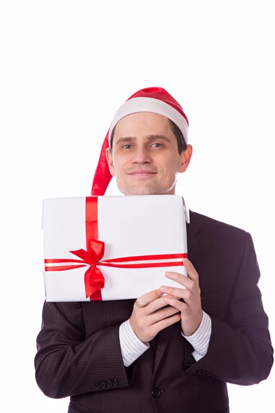 Man in suit and hat with Christmas gift hand on white backgro — Stock Photo, Image