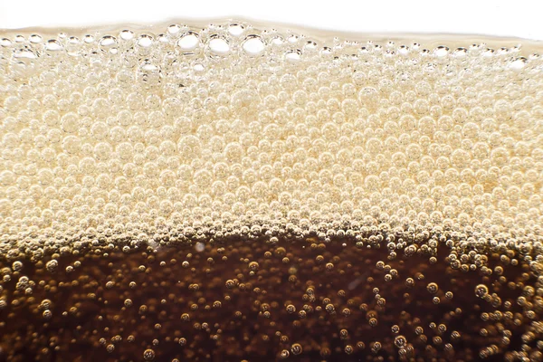 Macro zeepbel en schuim op de glazen wand van cola — Stockfoto