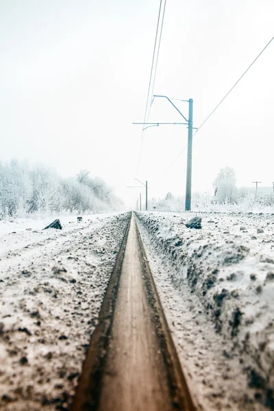 Gradient colorize railway in the winter forest, view from — Stock Photo, Image