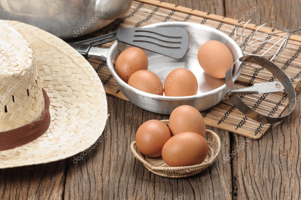 closeup group of fresh eggs on wooden plank — stock photo
