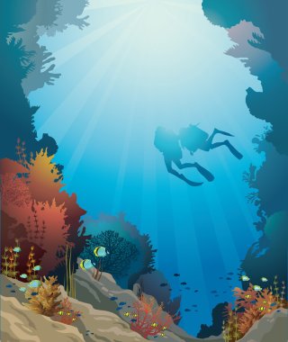 Mercan, sualtı mağara ve dalgıçlar.