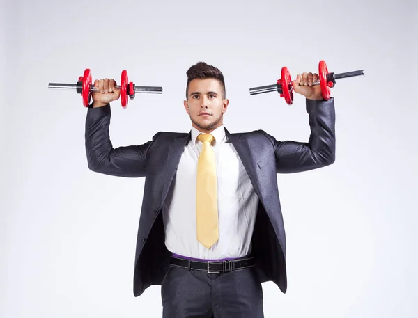 Strong Businessman Lifting Heavy Weights — Stock Photo, Image