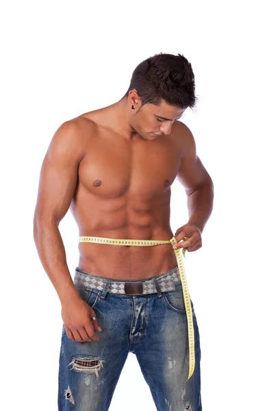 有完美腹肌测量腰围的男人 — 图库照片