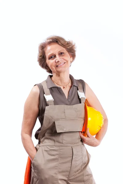 Gelukkig Senior Vrouw Met Een Veiligheidsmuts Geïsoleerd Wit — Stockfoto