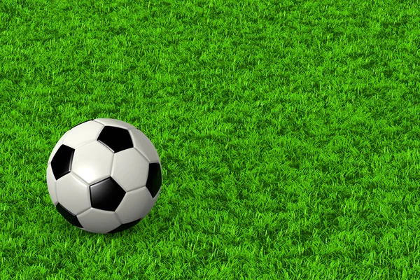 Pelota de fútbol en el campo de hierba — Foto de Stock