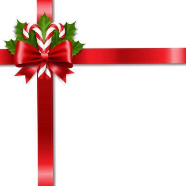 Noel kurdelesi ve lolipop beyaz arka planlı Holly Berry