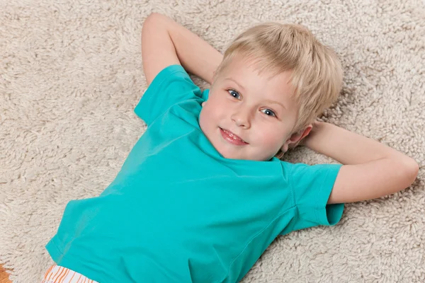 Cute smiling little boy resting — Stock Photo, Image