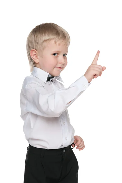 Handsome little boy shows his finger up — Stock Photo, Image