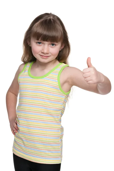 Adorável menina segurando seus polegares para cima — Fotografia de Stock