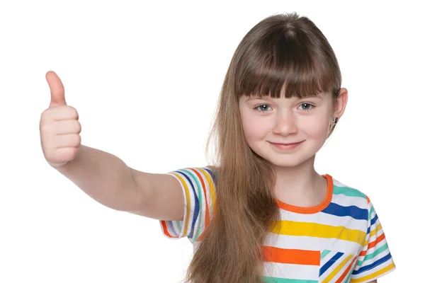 Happy young girl holds her thumbs up — Stock Photo, Image
