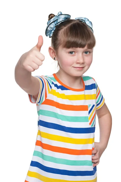 Adorable little girl holds her thumbs up — Stock Photo, Image