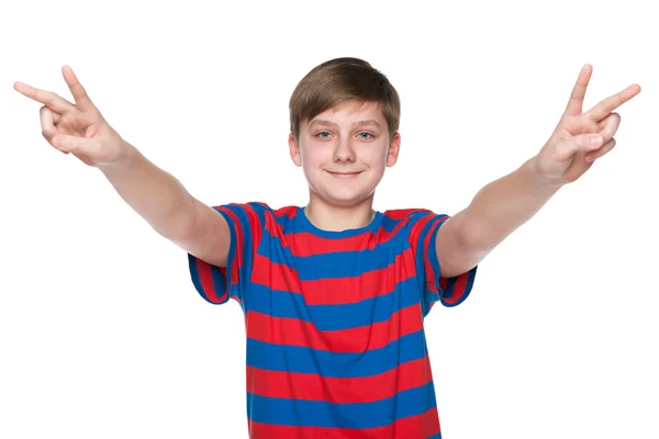 Adolescente menino celebra vitória — Fotografia de Stock