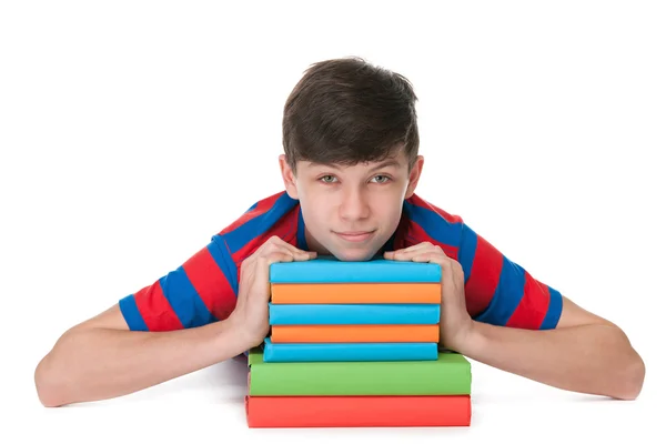Tonåring pojke med böcker — Stockfoto