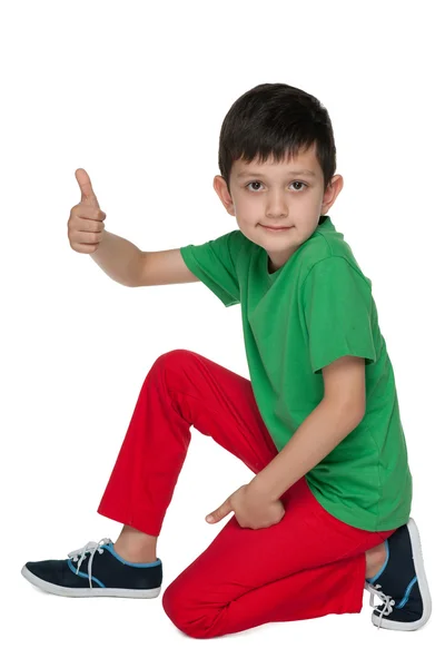 Menino bonito com o polegar para cima — Fotografia de Stock