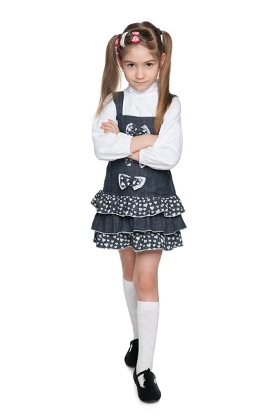 Serious little girl on the white — Stock Photo, Image