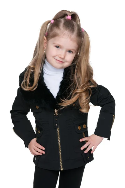 Härlig liten flicka i svart jacka — Stockfoto