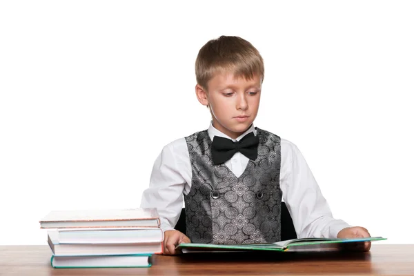 Young boy at the desk — Stock Photo, Image