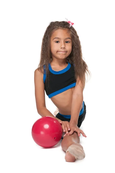 Pequeña gimnasta con una pelota —  Fotos de Stock