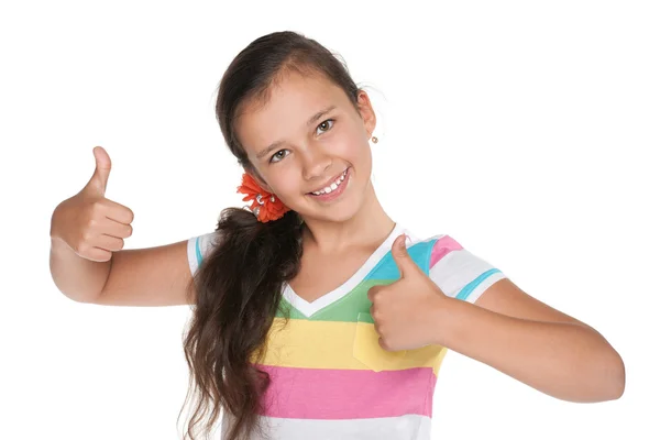 Pretty girl holds her thumbs up — Stock Photo, Image