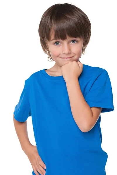 Schattige kleine jongen in een blauw shirt — Stockfoto