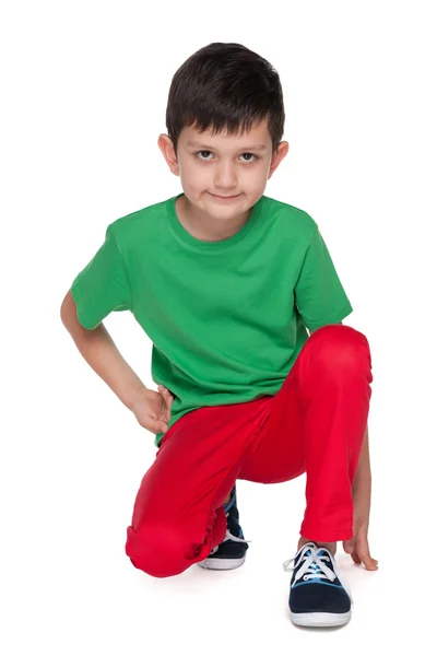 Menino bonito na camisa verde — Fotografia de Stock